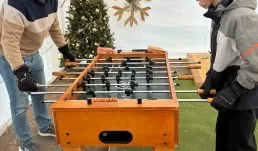 Kids of all ages will love to play carpet ball, foosball, and connect 4 while enjoying some complimentary hot fresh popcorn in our warmed game tent.